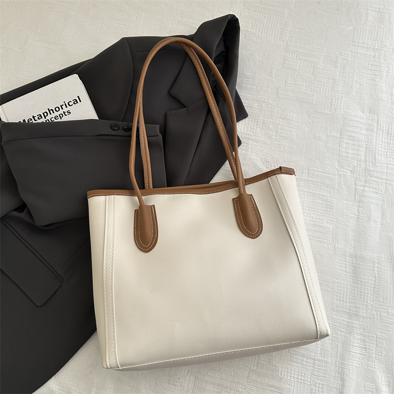 Bolsa axillar de gran capacidad para mujeres 2024 nueva moda otoño invierno sensación de bolso de hombro para estudiantes casuales bolso de clase