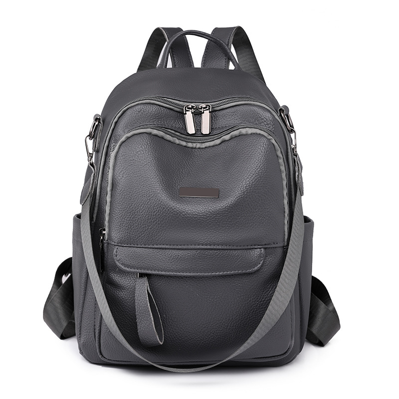 Comercio exterior al por mayor 2023 nueva mochila impermeable de cuero suave para mujer casual mochila multifuncional simple y versátil de doble uso