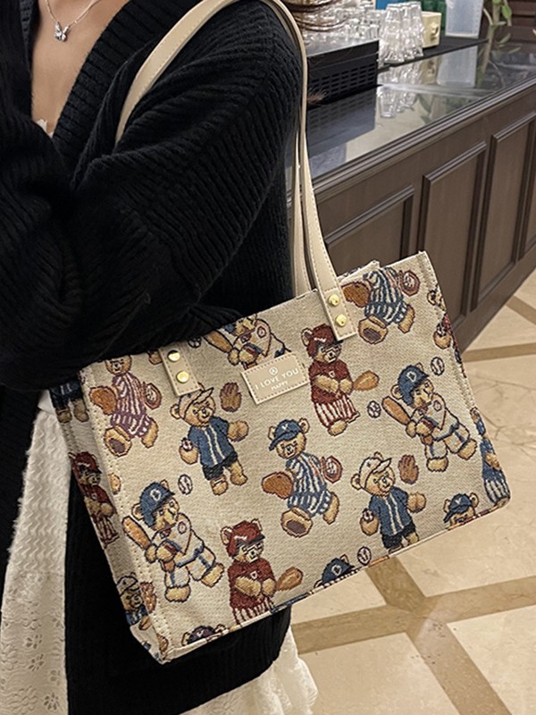 Bolsa de lona impresa de dibujos animados para mujeres 2024 nueva bolsa de gran capacidad, bolsa de hombro de viaje casual versátil