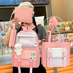 書包中小學生新款休閒帆布背包大容量女韓版雙肩包手提補習袋批發