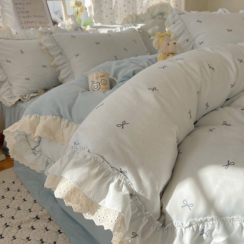 Un tipo de hilo de doble capa cama de corazón de niña coreana de cuatro piezas estilo princesa encaje funda de edredón sábana falda de cama ropa de cama 4