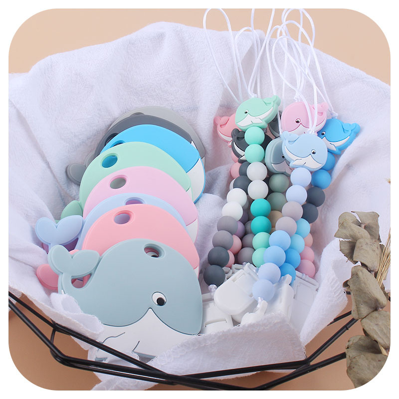 Amazon nuevo bebé ballena de silicona chupete Cadena de dientes de bebé Cadena de molienda calmante cadena anti-caída