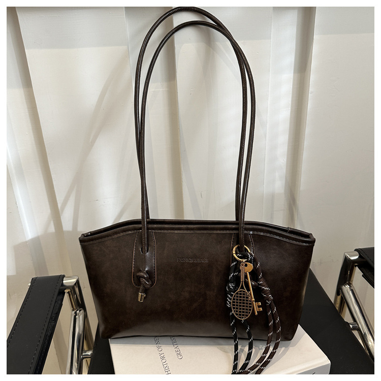 Commuting mujeres de color sólido 2024 nuevo otoño invierno retro moda texturas colgantes casuales de hombro bolso