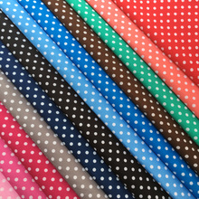 涤纶圆点印花布料箱包玩具抱枕梭织家纺点点平纹桃皮绒波点