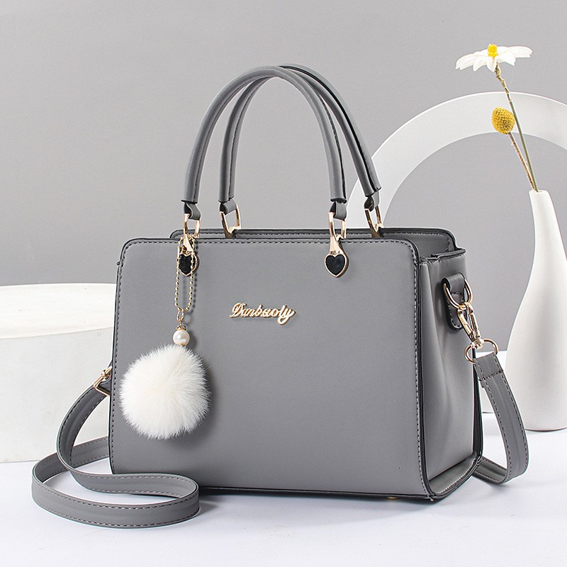 Bolso de mujer Taizhou bolso de mujer bolso de color sólido atmósfera inclinada bolso de hombro bolso de mujer bolsos de mediana edad