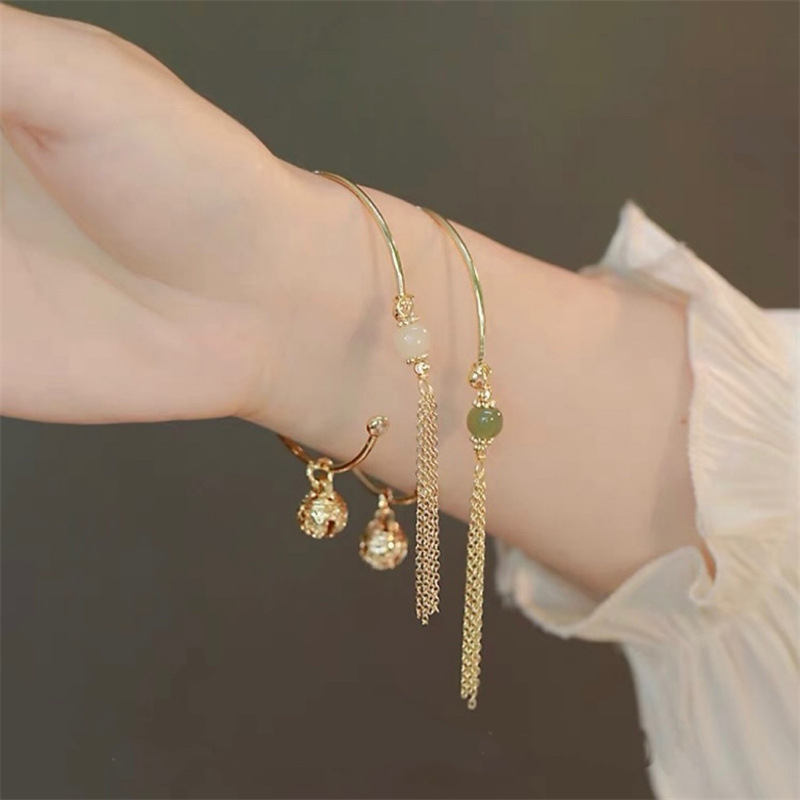 Glossy small bell with bow with tassels