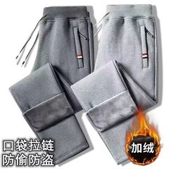 秋冬のカジュアルパンツの男性のベルベットは男性のスポーツパンツの保温パンツのゆるいズボンを厚くして太っている