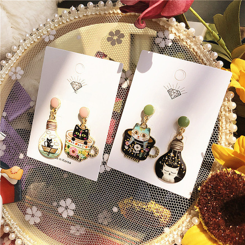 New cat lover series has a cute tea cup light bulb cat cat asymmetric 925 silver earrings 
