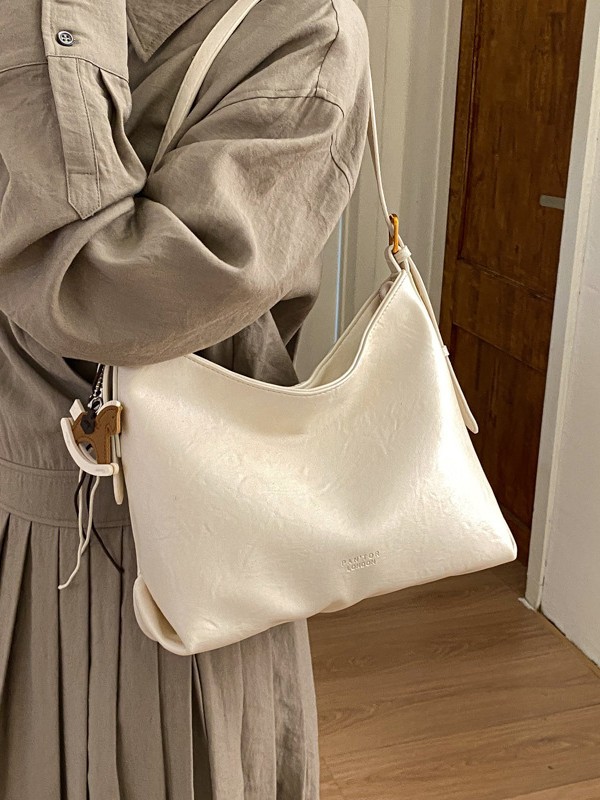 Alta sensación de gran capacidad de viaje bolsa de mano para mujeres Europa y América textura nicho de moda simple universal bolsa de hombro