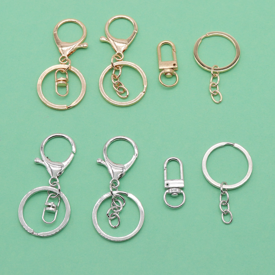 Fábrica al por mayor todo tipo de metal llavero accesorios de aleación langosta hebilla cadena hebilla 8-palabra llavero accesorios al por mayor