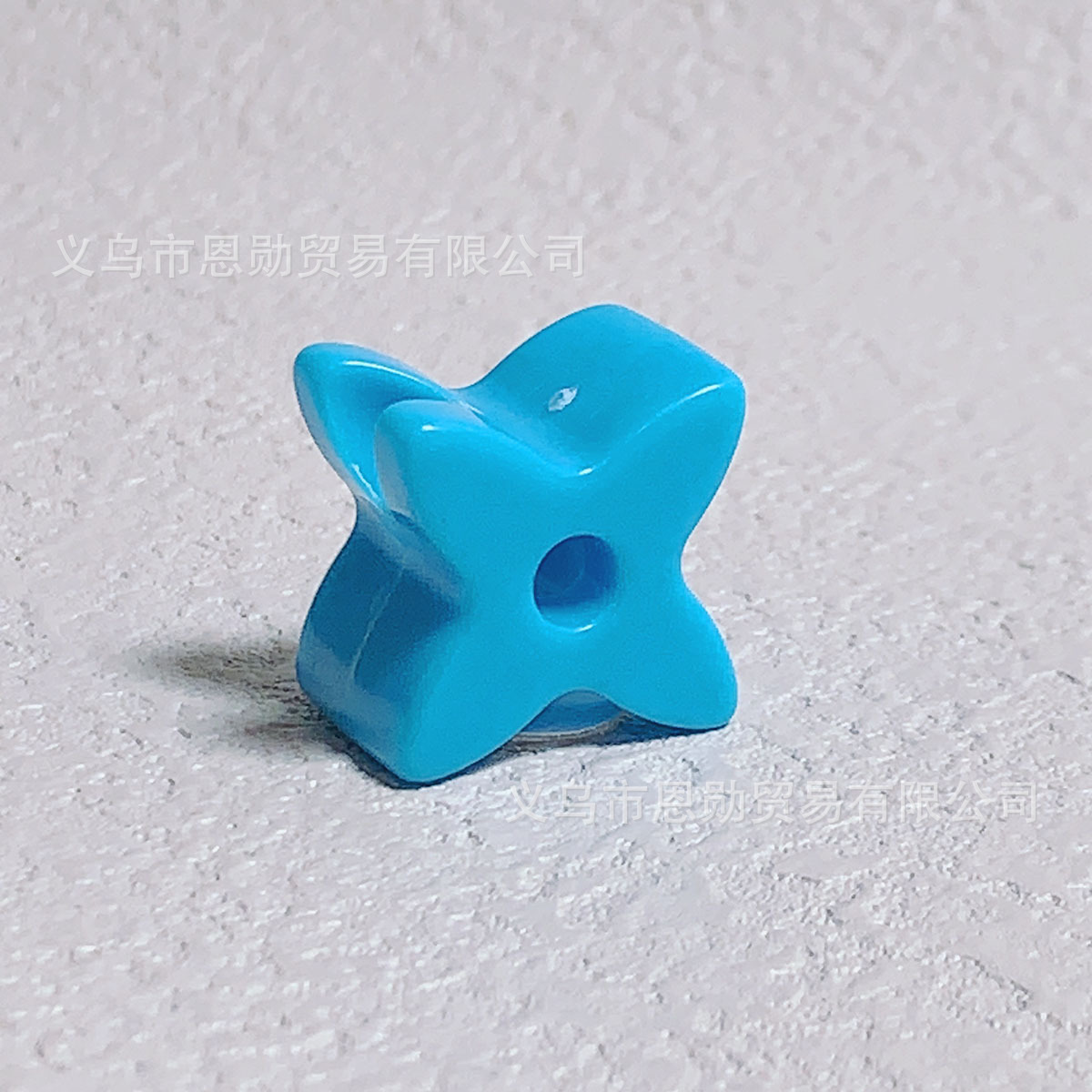 X (blue)