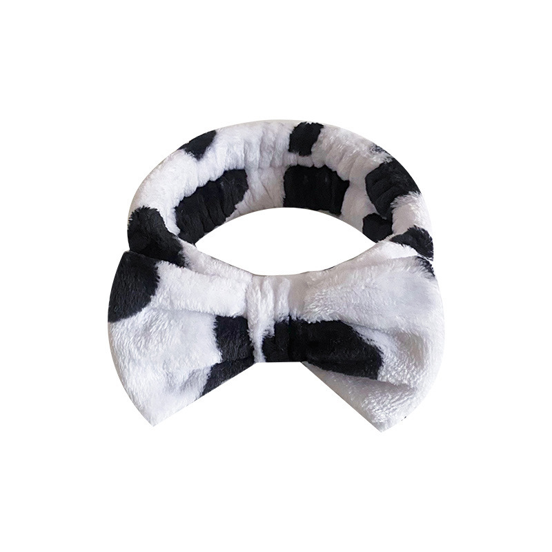 Europa y los Estados Unidos ondulado punto de leopardo coral mariposa fin correa de cabello mujer lavado cara banda de cabello rayas transfronterizas peluche adornamientos para el cabello al por mayor