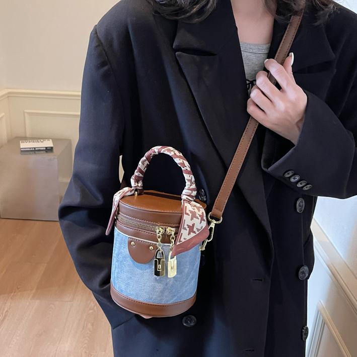 Color contrastante simple bolso de cubo de mano para mujeres 2024 nueva moda versátil mochila mochila de tela extranjera bolso de hombro