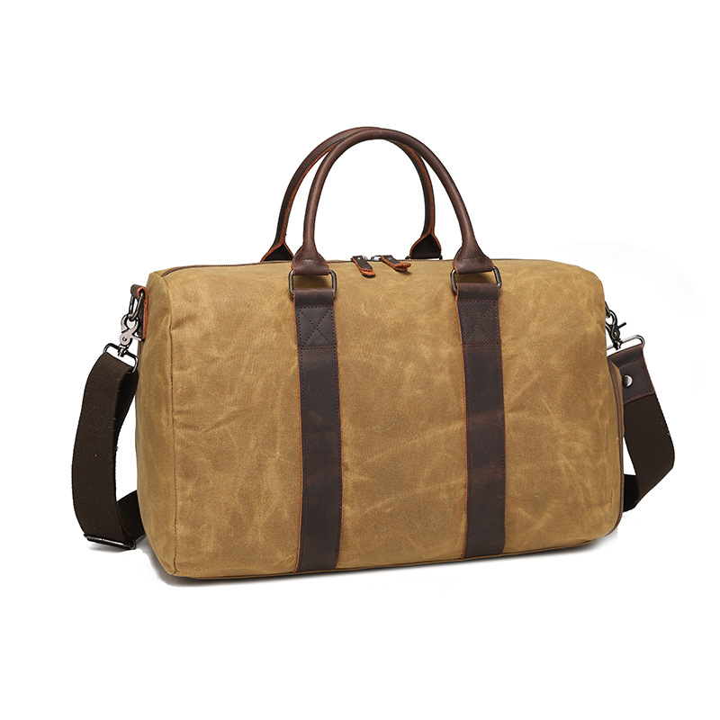 Nueva bolsa de viaje de tela de cera de aceite resistente al desgaste retro europea y americana color sólido bolsa de hombro al aire libre bolsa de almacenamiento al por mayor