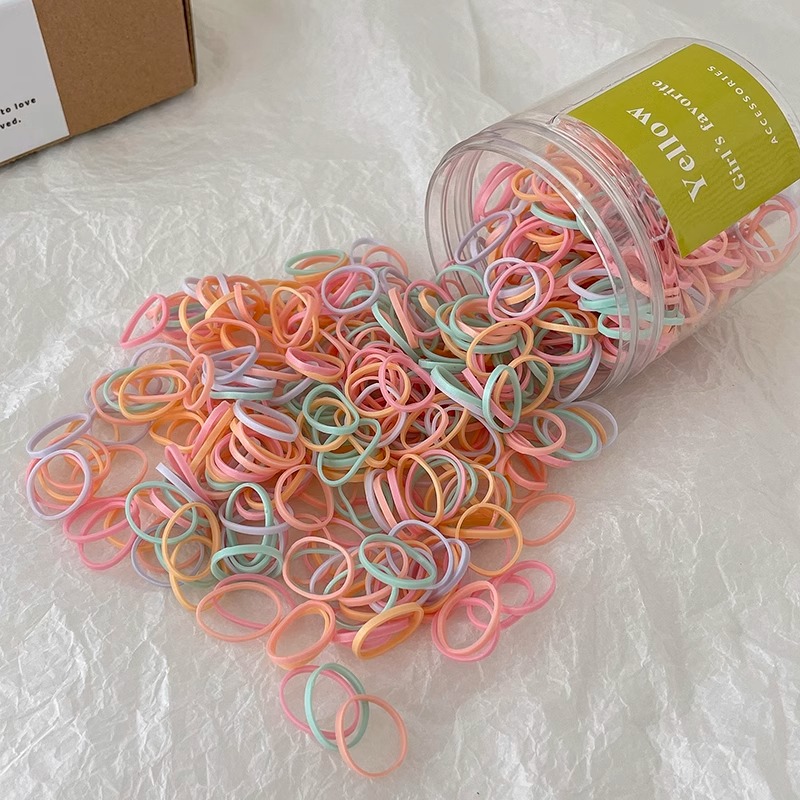 Cuerda para la cabeza con lazo para el cabello con cola de caballo para niños pequeños 2025 nueva banda de goma desechable para bebés cuerda para el cabello con funda de cuero pequeña duradera