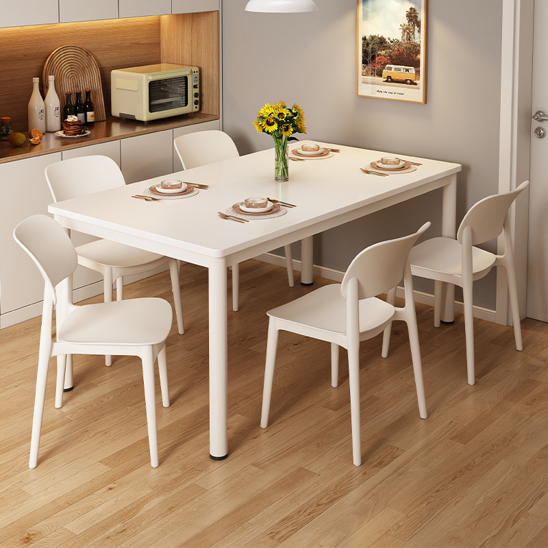 A modern cream minimalist rectangular dining table suitable for small apartments, long dining table for rent, living room small table