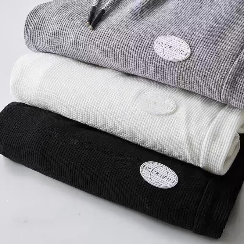 Pantalones casuales forrados de lana de los hombres de otoño e invierno deportes ins moda niños tobillo-atado suelta más tamaño waffle Pantalones