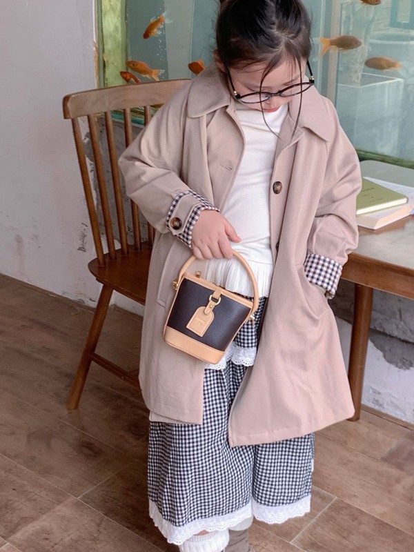 Mini pequeño bolso de cubo de mano para niños 2026 nuevo estilo de alta calidad de moda versátil bolso de mochila de estilo exterior
