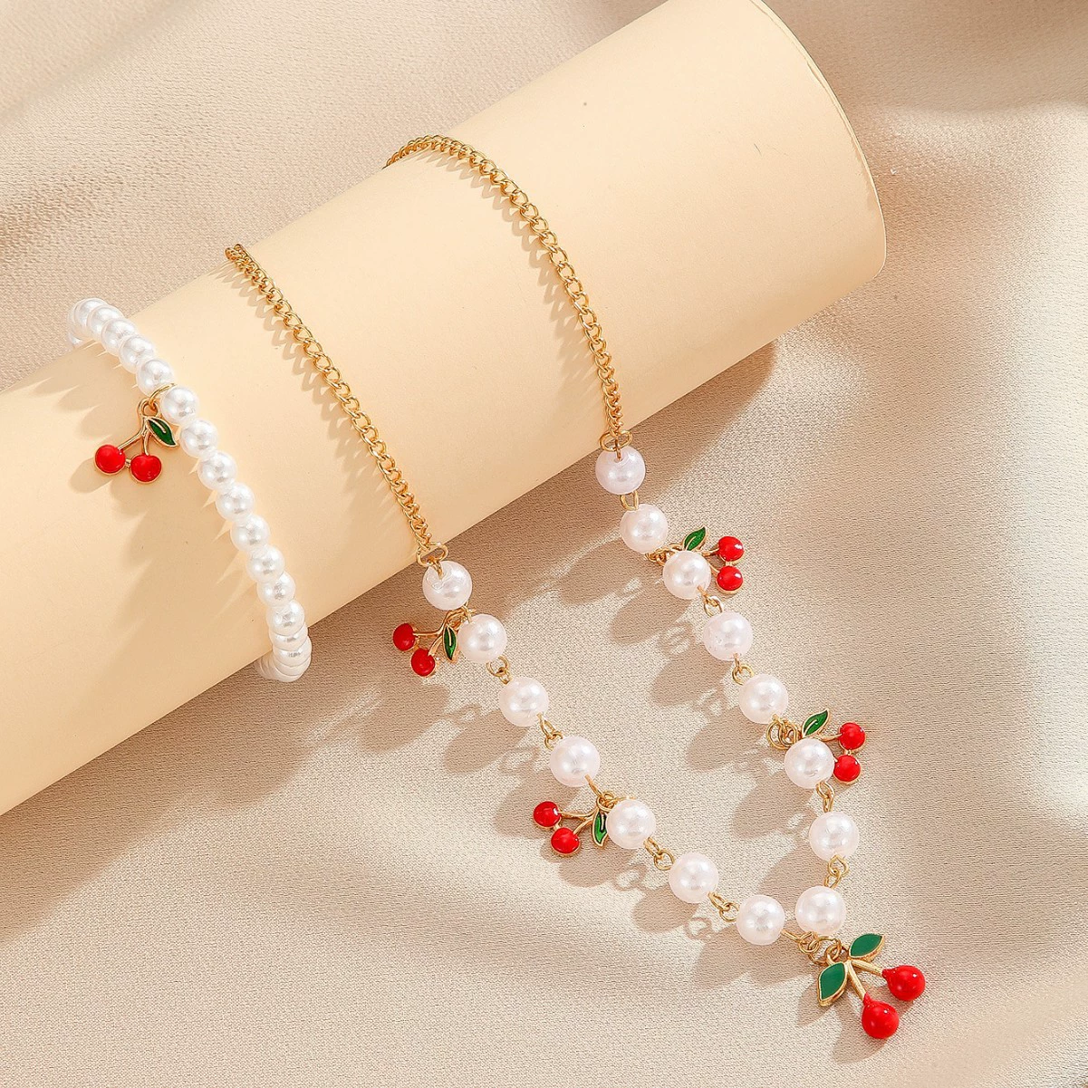 Европейский и американский трансграничный комплект ожерелья с подвеской в ​​виде вишни, браслет, нишевая милая легкая роскошная высококачественная жемчужная цепочка на ключицу для женщин