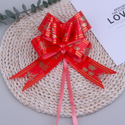 Large bonsai bow congratulating wealth pulling flower opening decoration God of Wealth blessing word celebration Phnom Penh red ribbon