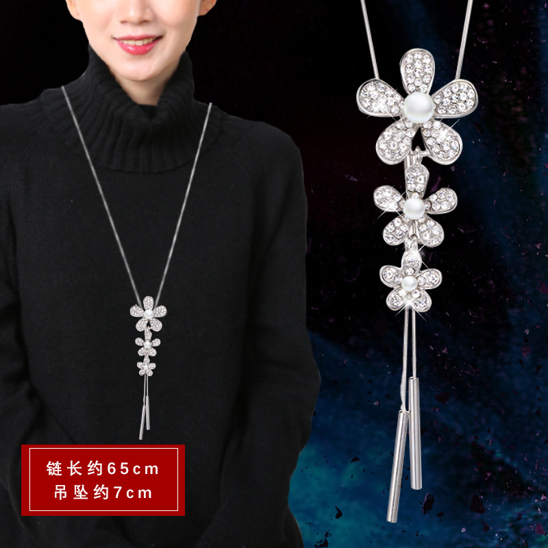 Otoño e invierno ligero estilo de lujo suéter Cadena de alto grado de las mujeres todo partido largo borla collar perla colgante accesorios al por mayor