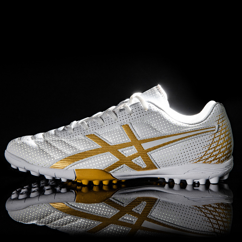 Zapatos de fútbol para hombres y mujeres estudiantes adolescentes AG clavos largos entrenamiento de carreras de clavos al por mayor tecnología ventilada para adolescentes