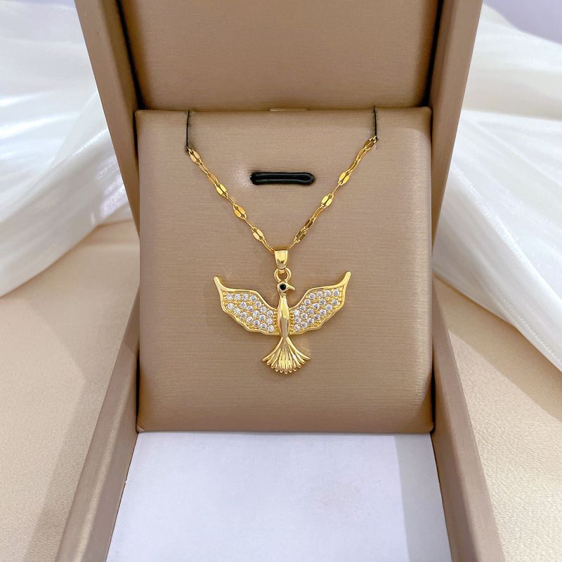 Colar de pássaro voador com diamantes em aço de titânio_voghion.com