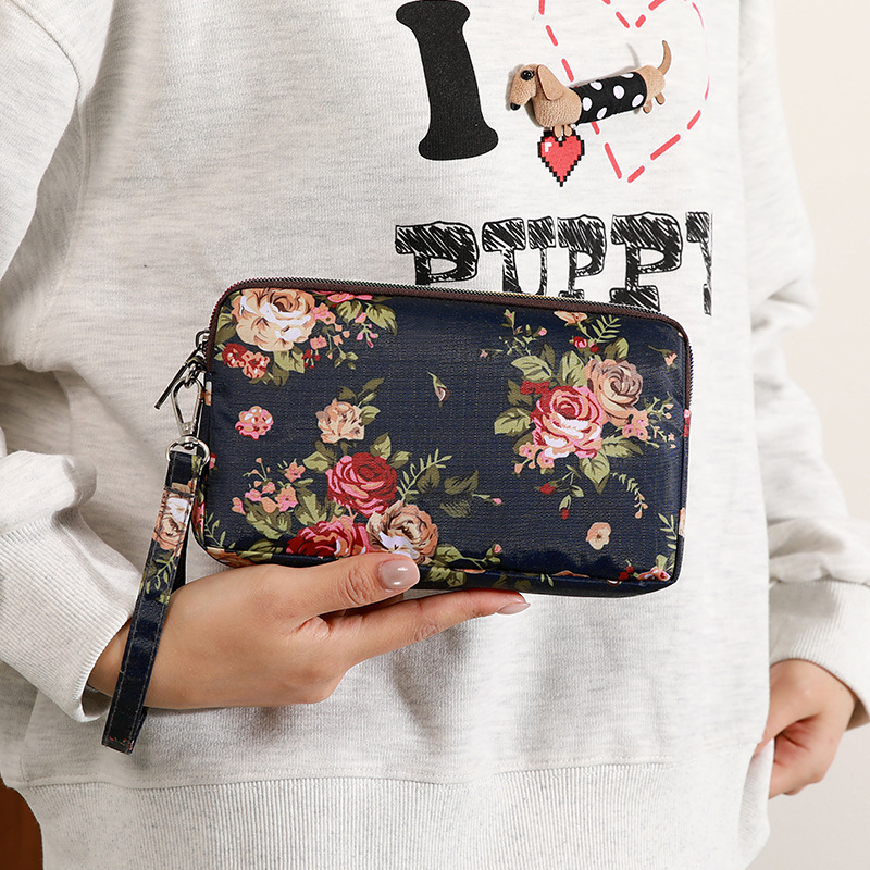 Mayorista bolso de teléfono móvil grande una sola capa cremallera larga bolso de cambio de mujer bolso de mano bolso de cambio de llaves color