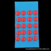 20 capsules (6mm in diameter) of red small dots (6mm in diameter)