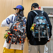 涂鸦2024新款大学生旅行大容量高中初中生潮时尚涂鸦双肩包背包女