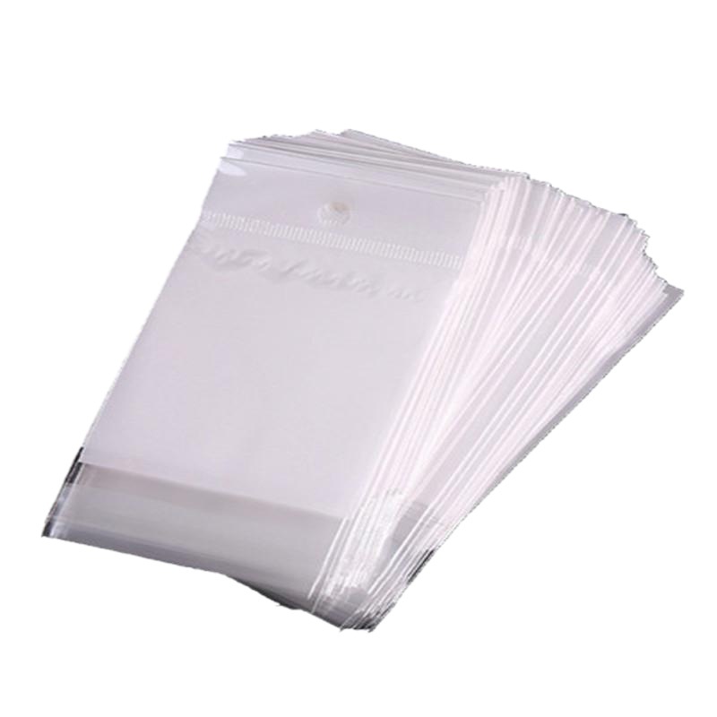Fábrica en stock venta al por mayor OPP autoadhesivo transparente autoadhesivo bolsa blanca perla película joyería bolsa pulsera bolsa
