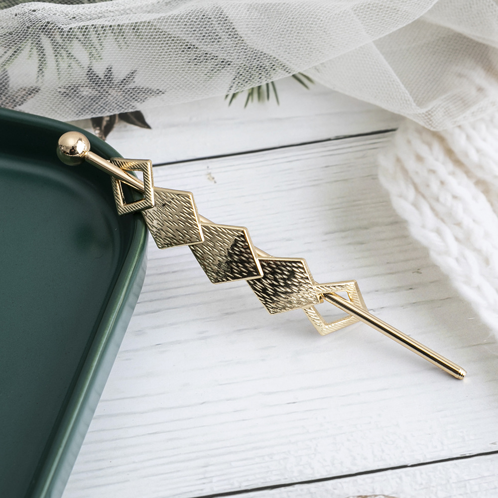 Estilo coreano aleación clip tocado exquisita horquilla de metal europeo y americano simple flecha perla horquilla rizador de pelo