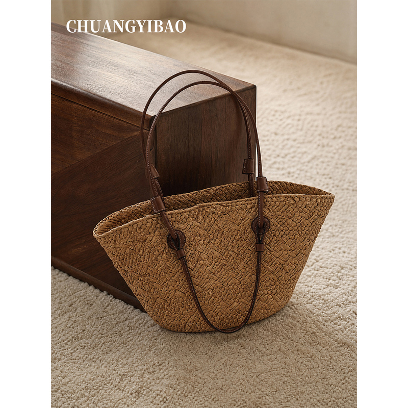 Beach vacation style straw tote bag for women, 2026 new summer light luxury niche high-end woven bucket bag