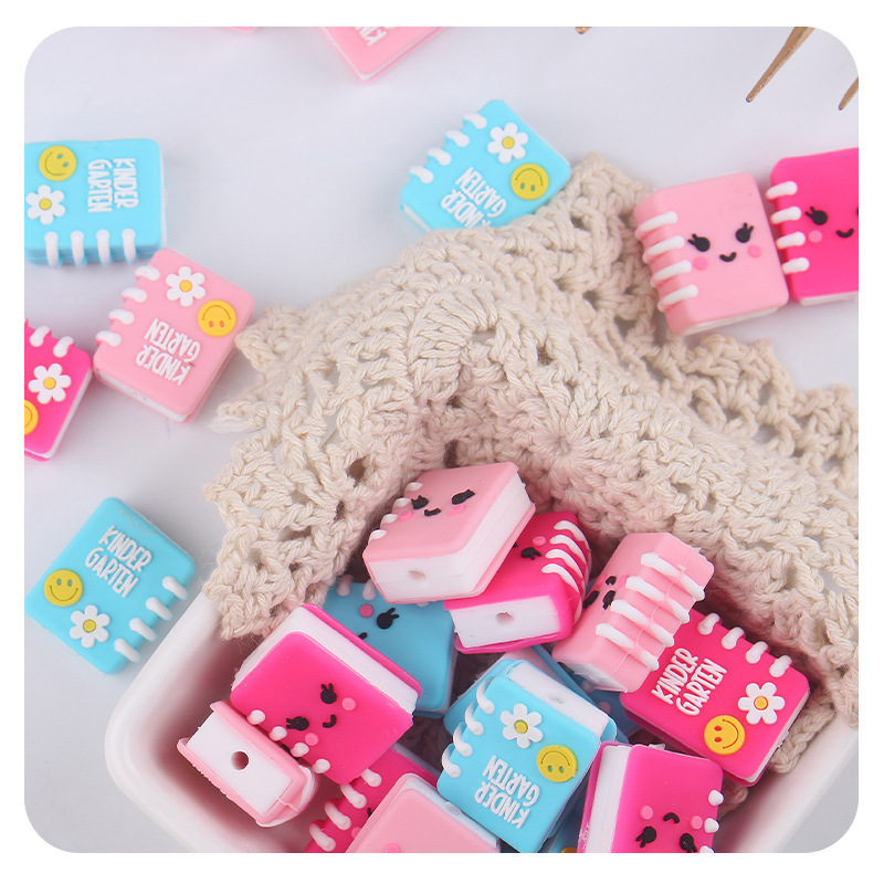 Bebés y niños pequeños dibujos animados silicona cuaderno dentín bebé creativo DIY pacificante chaqueta pulsera accesorios juguetes