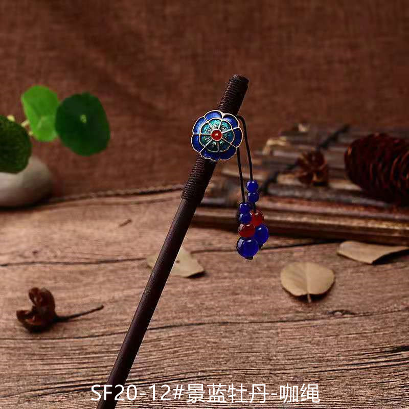 黒檀の木のかんざしのフリンジをまねて、かんざしの子供の古風な頭飾りをします。|undefined