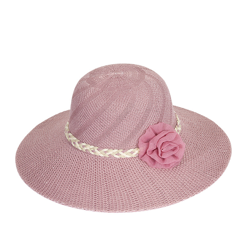 Women's Simple Style Flower Big Eaves Straw Hat display picture 1