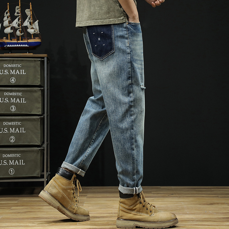 Herr vår/sommar ny produkt Big Bull Wind perforerade jeans lösa, lätta, andningsbara 9/4 fotbyxor_voghion.com