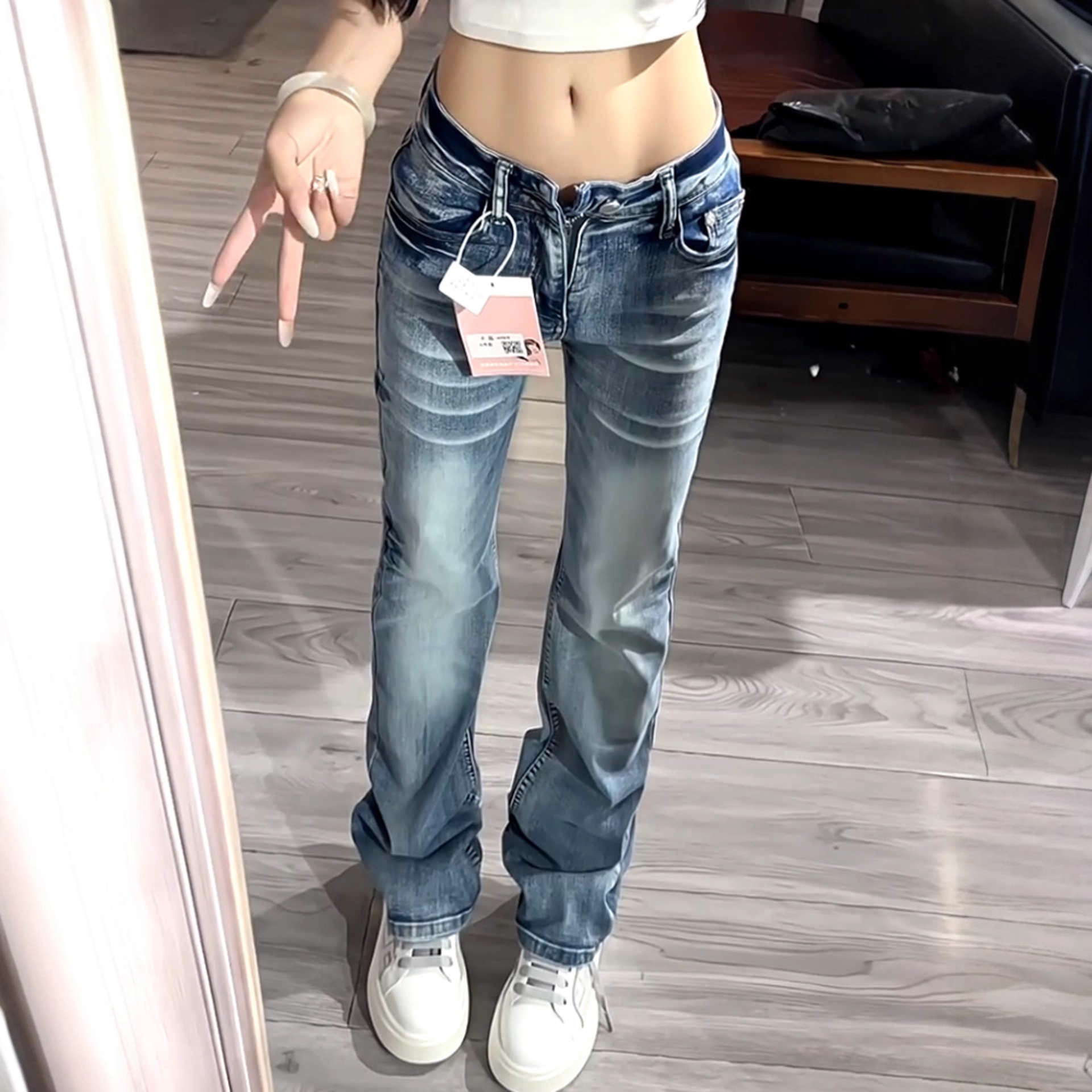 美式高街毛须低腰微喇牛仔裤女秋冬2025新款设计感弹力窄版直筒裤