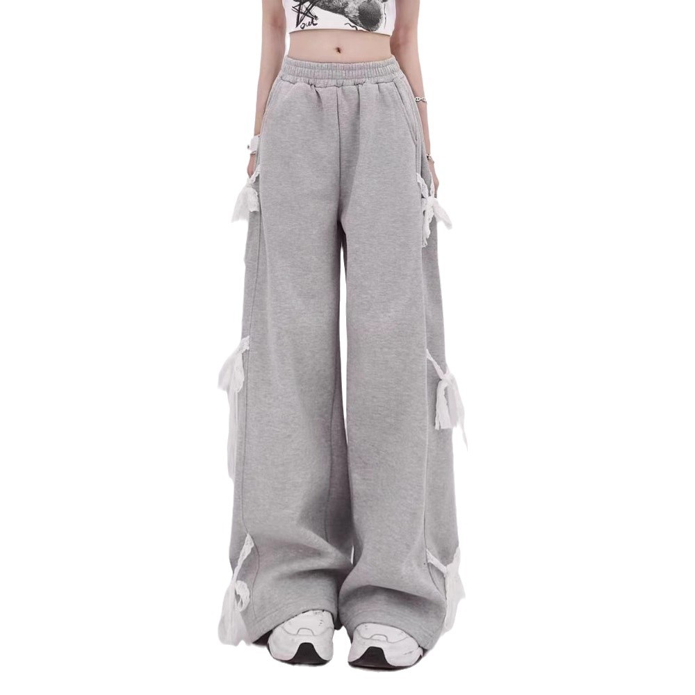 아메리칸 스타일 레트로 달콤한 쿨 스트라이프 활 장식 캐주얼 바지 여성의 이른 봄 디자인 감각 느슨한 스트레이트 스포츠 바지