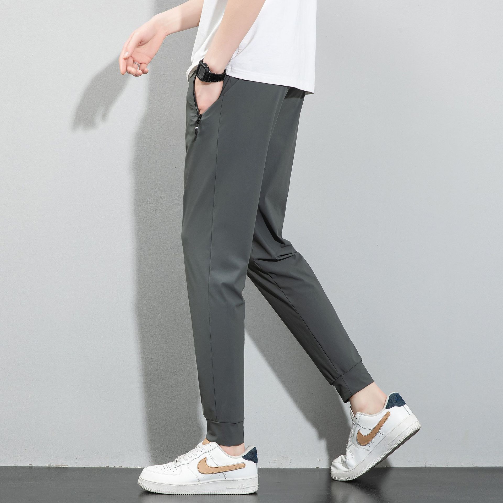 Pantalones de verano de hielo de tamaño grande para hombres pantalones deportivos de barril recto, piernas de ángulo plano sin quemar, secado rápido pantalones casuales al por mayor