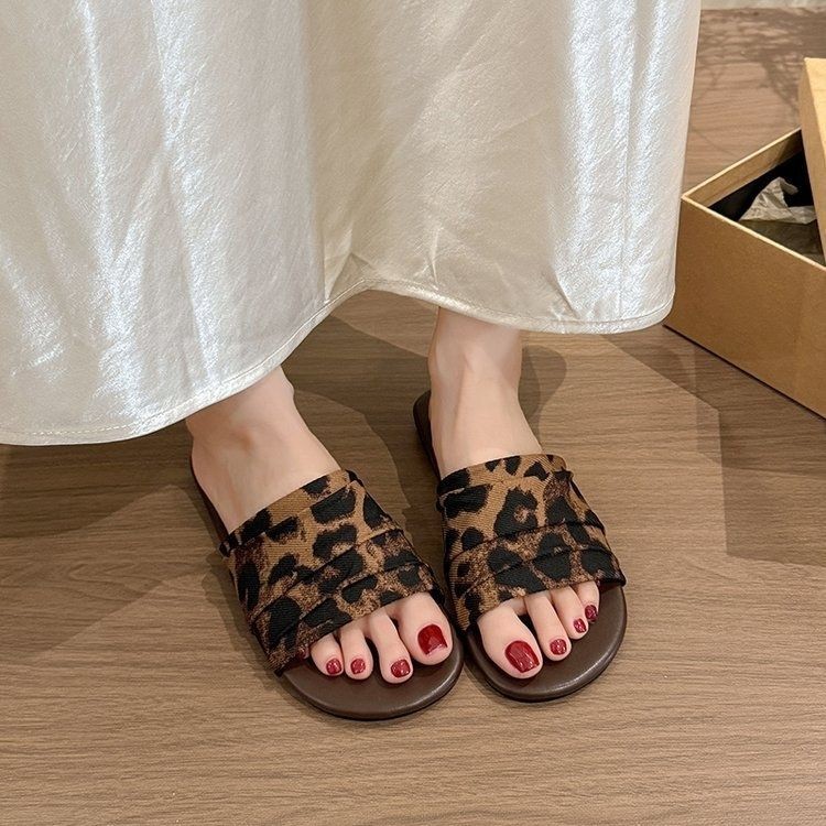 Nicho francés pliegue zapatillas planas de verano para mujeres 2026 nuevas zapatillas de playa de vacaciones