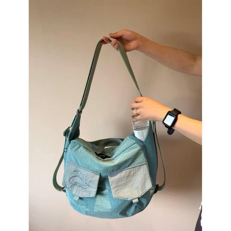 Lightweight, versatile nylon bag: waterproof, can be carried as a shoulder bag, crossbody bag, tote bag, or backpack, with a unique and trendy design