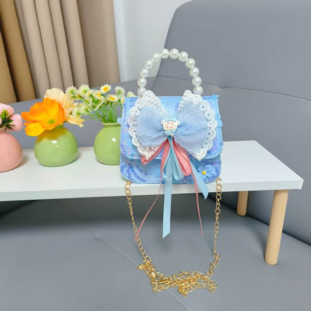Bow princess pearl bolso Melody KT felino mochila accesorios de chicas pequeñas cadenas de viento fragante bolso para niños