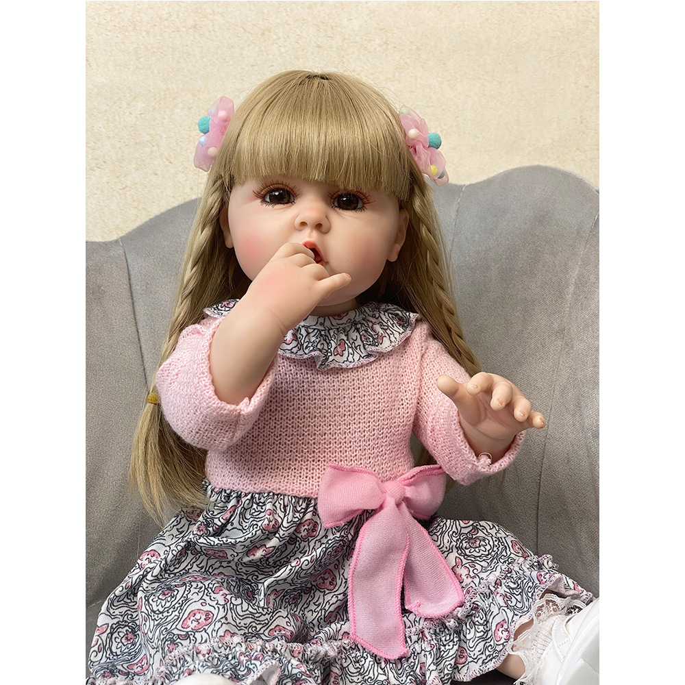 Nueva 55cm simulación bebé reborn muñeca juguete transfronterizo muñeca llena de vinilo TikTok entrega de una pieza