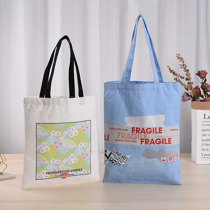 卡通棉布袋批发 创意广告礼品购物手提袋暗扣收纳帆布袋可印logo