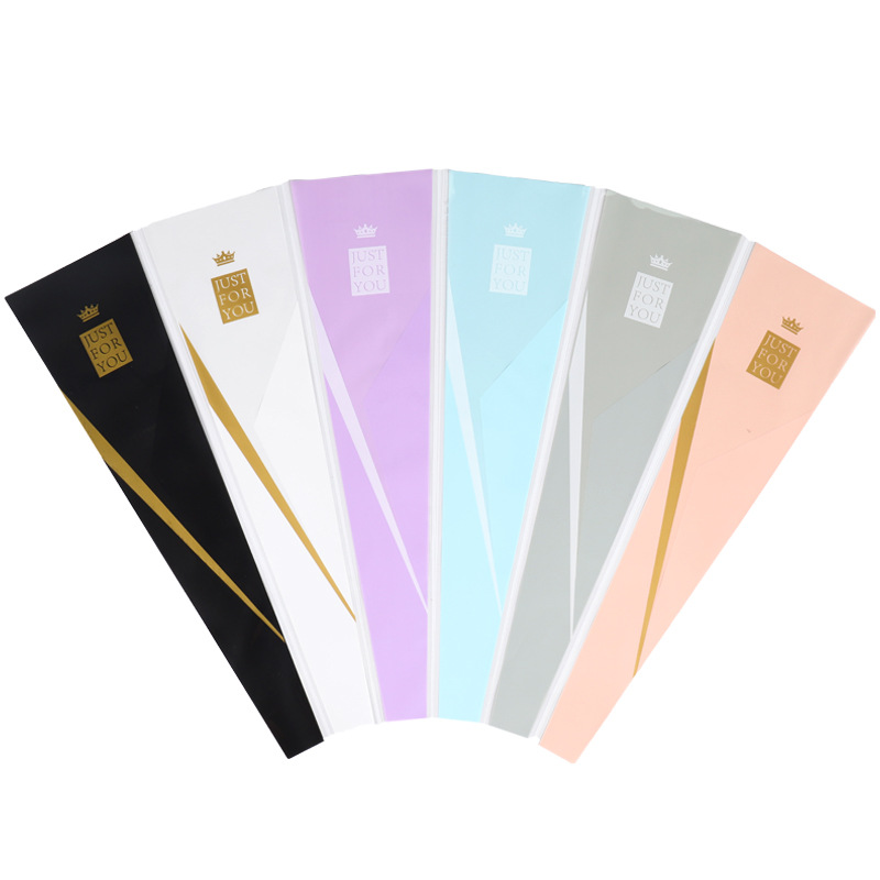 Nueva tienda de flores material de embalaje floral Día de San Valentín flor Rosa bolsa de embalaje ramo bolsa de triángulo corona bolsa individual