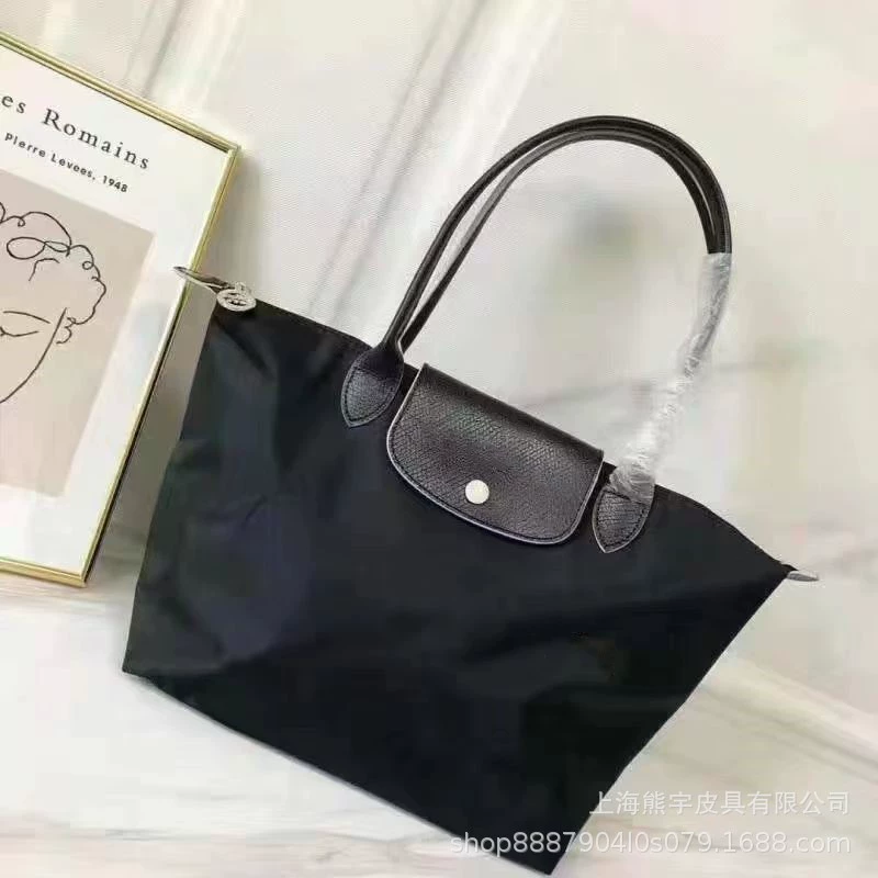 Foldable capacious purse for mother and baby, one-shoulder bag