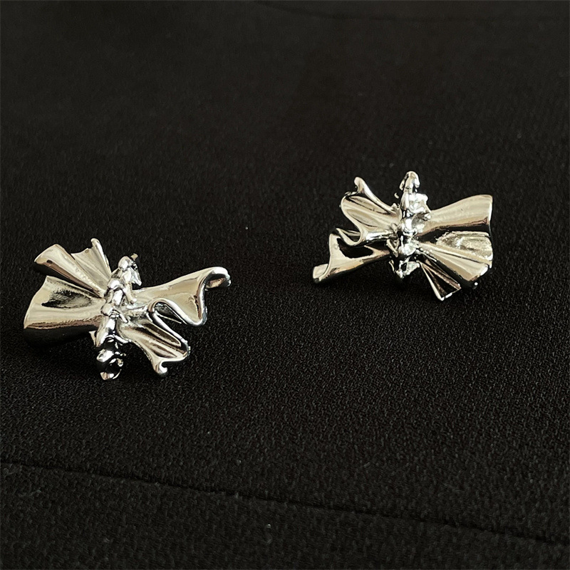 Folded Earrings Niche Design Bowknot Personality Silver Needle Earrings Korean Irregular Earrings display picture 1