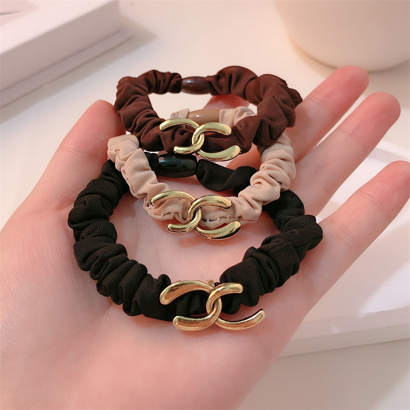 aleación de moda intestino delgado cabello anillo de cabeza cuerda de mujer temperamento simple atar joyas de cabello nuevo estilo de alta sensación simple joyas de cabello cuerda