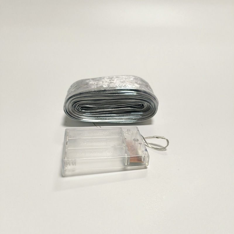 #D11圣诞发光彩带-10米100灯3AA常亮带闪暖白灯